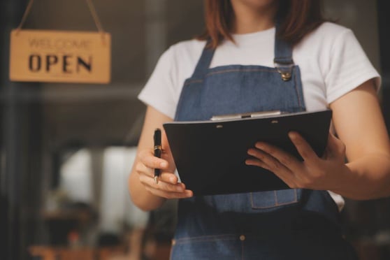 SME entrepreneur with a clipboard.