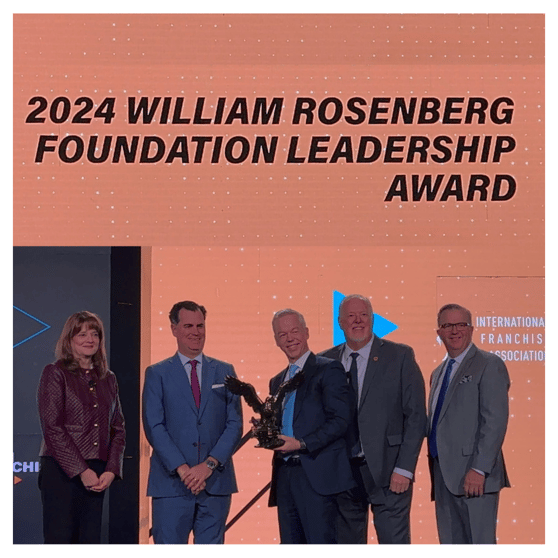 Dan Monaghan receiving the 2024 William Rosenberg Foundational Leadership Award from the IFA